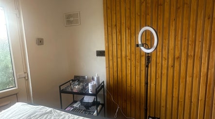 Cozy Studio No. 9 in Hucknall, England with a serene beauty setup and ambient lighting.