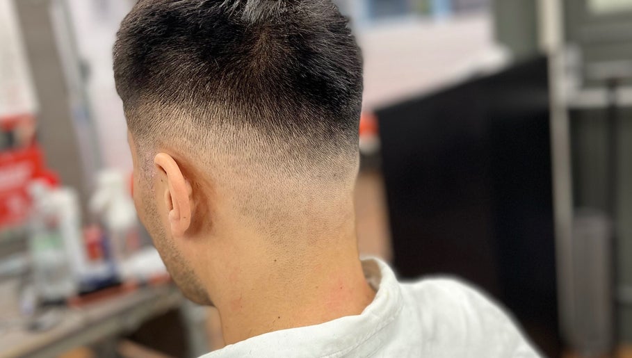 Close-up of a modern fade haircut at Lilliecutss, Brentwood, England, GB, showcasing expert styling.