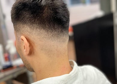 Close-up of a modern fade haircut at Lilliecutss, Brentwood, England, GB, showcasing expert styling.