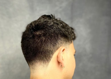 Close-up of a sleek fade hairstyle at Lilliecutss, Brentwood, England, GB.