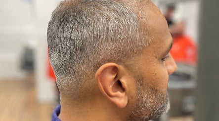 Profile of a man's stylish haircut at Lilliecutss, Brentwood, England, GB.