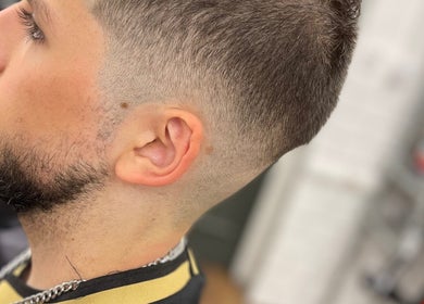 Close-up of a trendy tapered haircut at Lilliecutss, Brentwood, England, GB, showcasing precise styling.