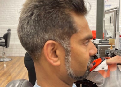 Man receiving a stylish haircut at Lilliecutss, Brentwood, England, GB.