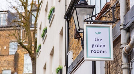 Outdoor sign of The Green Rooms near SOLUNA Holistic Massage Therapy, London, England, GB.