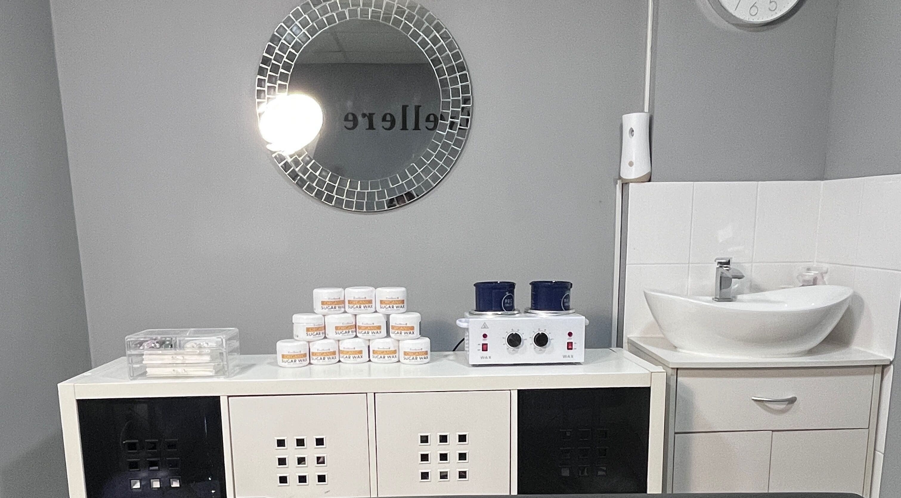 Evellere Sugar Waxing room in Bromley, England, featuring modern decor and waxing supplies.