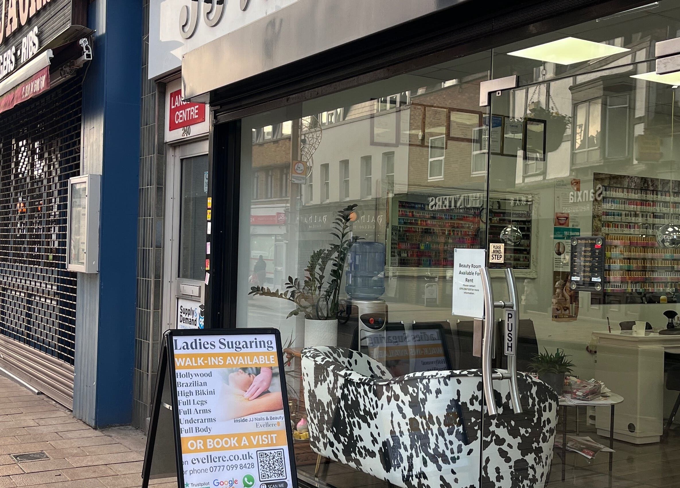 Front view of Evellere Sugar Waxing, Bromley, England, GB showcasing modern glass door entry.