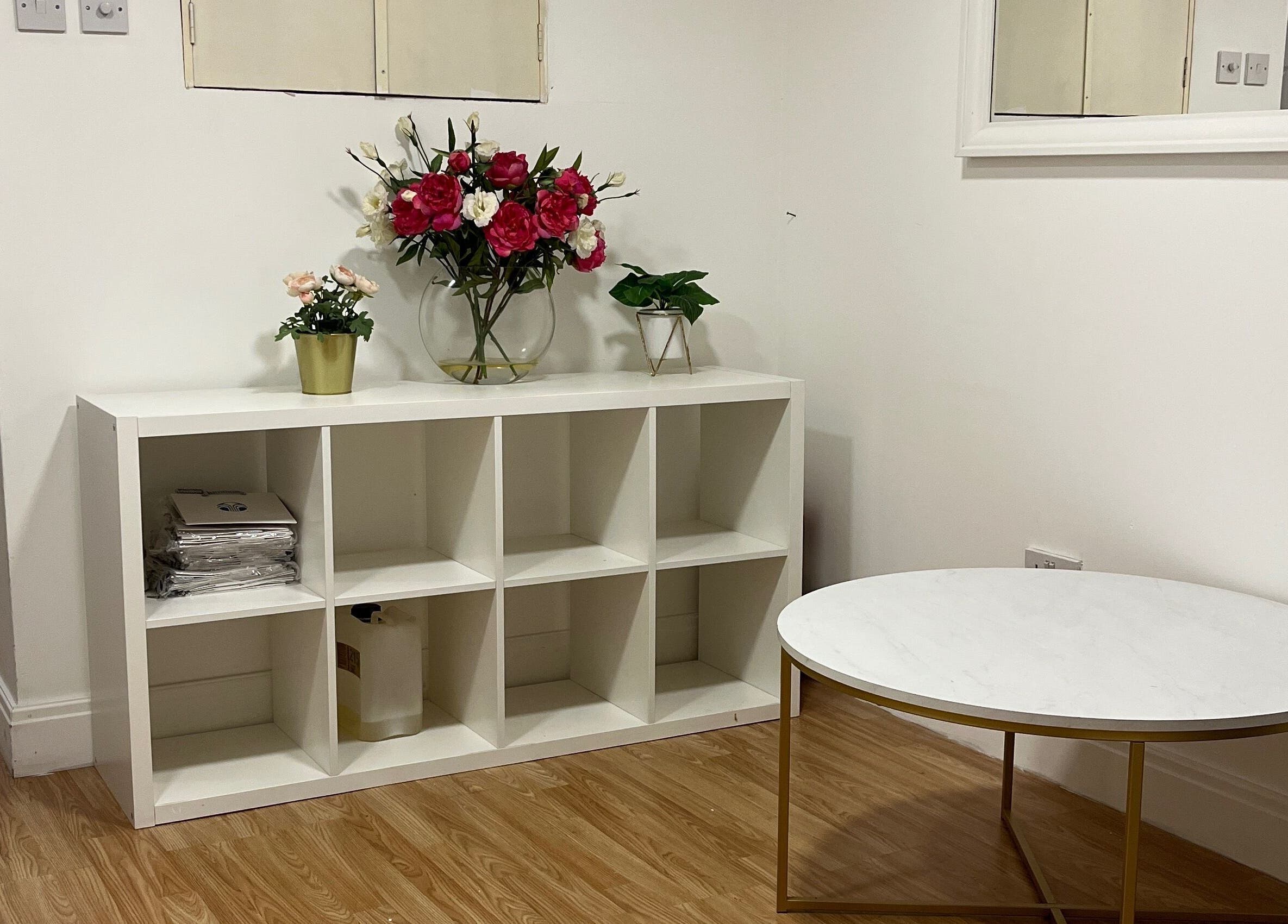 Chic interior decor at Evellere Sugar Waxing, featuring floral accents, Bromley, England, GB.