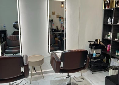 Modern salon chairs at FB Beauty Hair Salon in Langgar, Kedah, MY, showcasing chic styling area.
