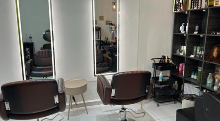 Modern salon chairs at FB Beauty Hair Salon in Langgar, Kedah, MY, showcasing chic styling area.