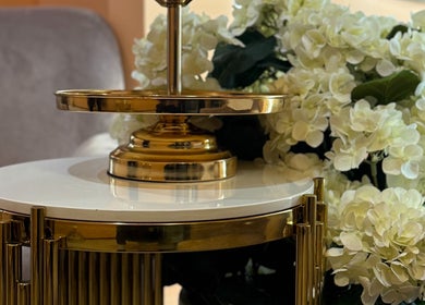 Gold-accented table and white hydrangeas at Rosie Nail Co, Melbourne, Victoria, AU.
