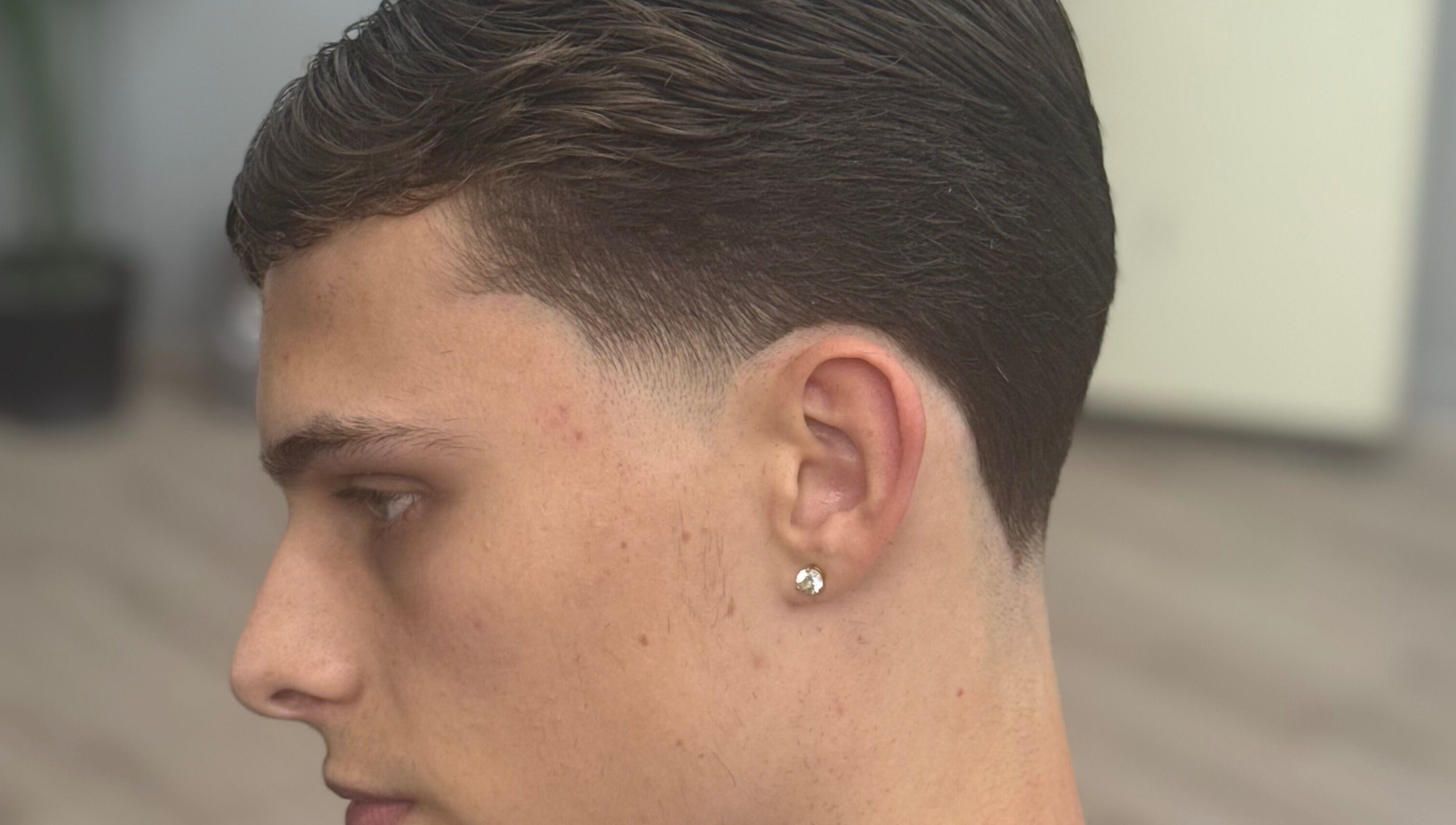 Side profile of a fresh haircut at ODCUTZ, Portlaoise, County Laois, IE highlighting clean lines.