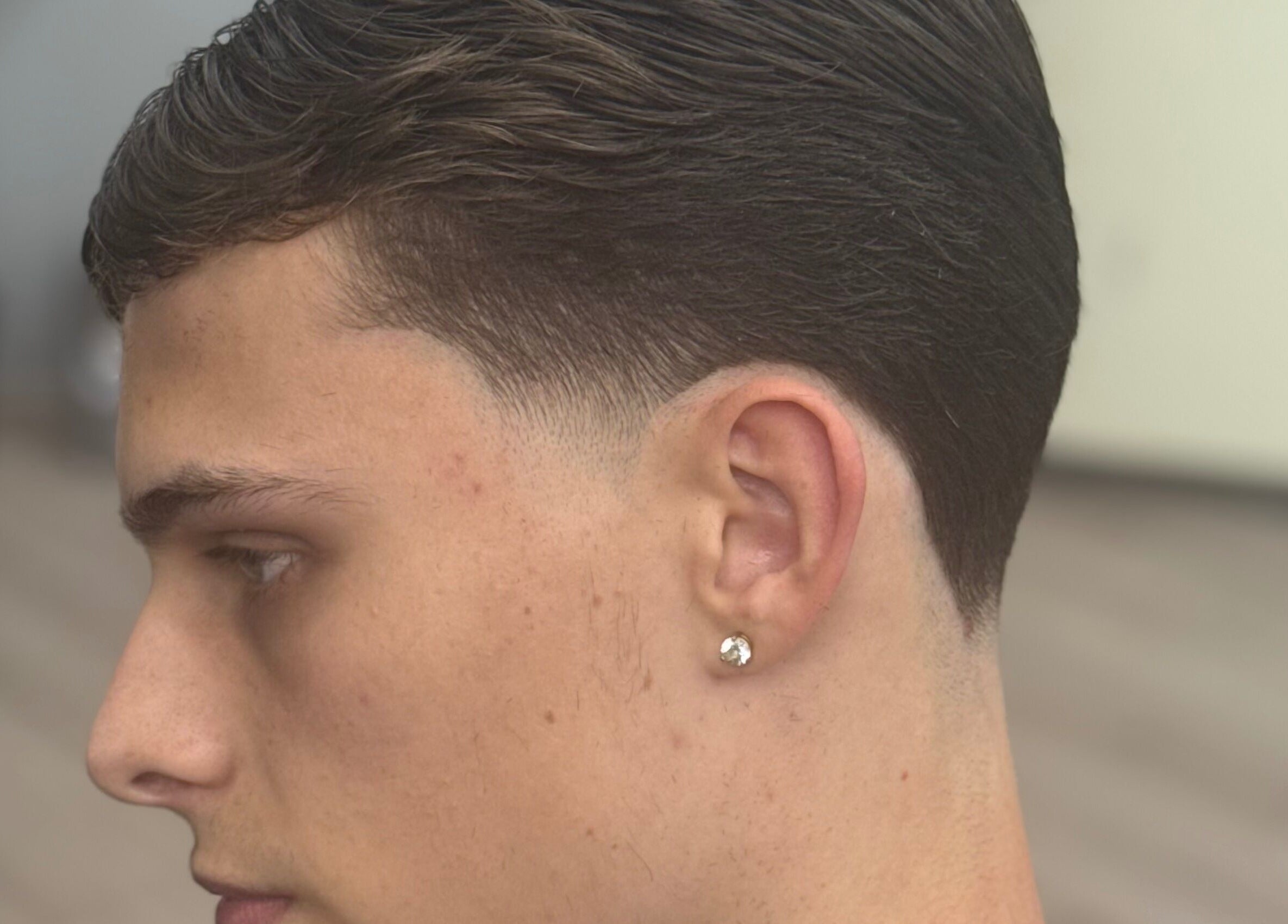 Side profile of a fresh haircut at ODCUTZ, Portlaoise, County Laois, IE highlighting clean lines.
