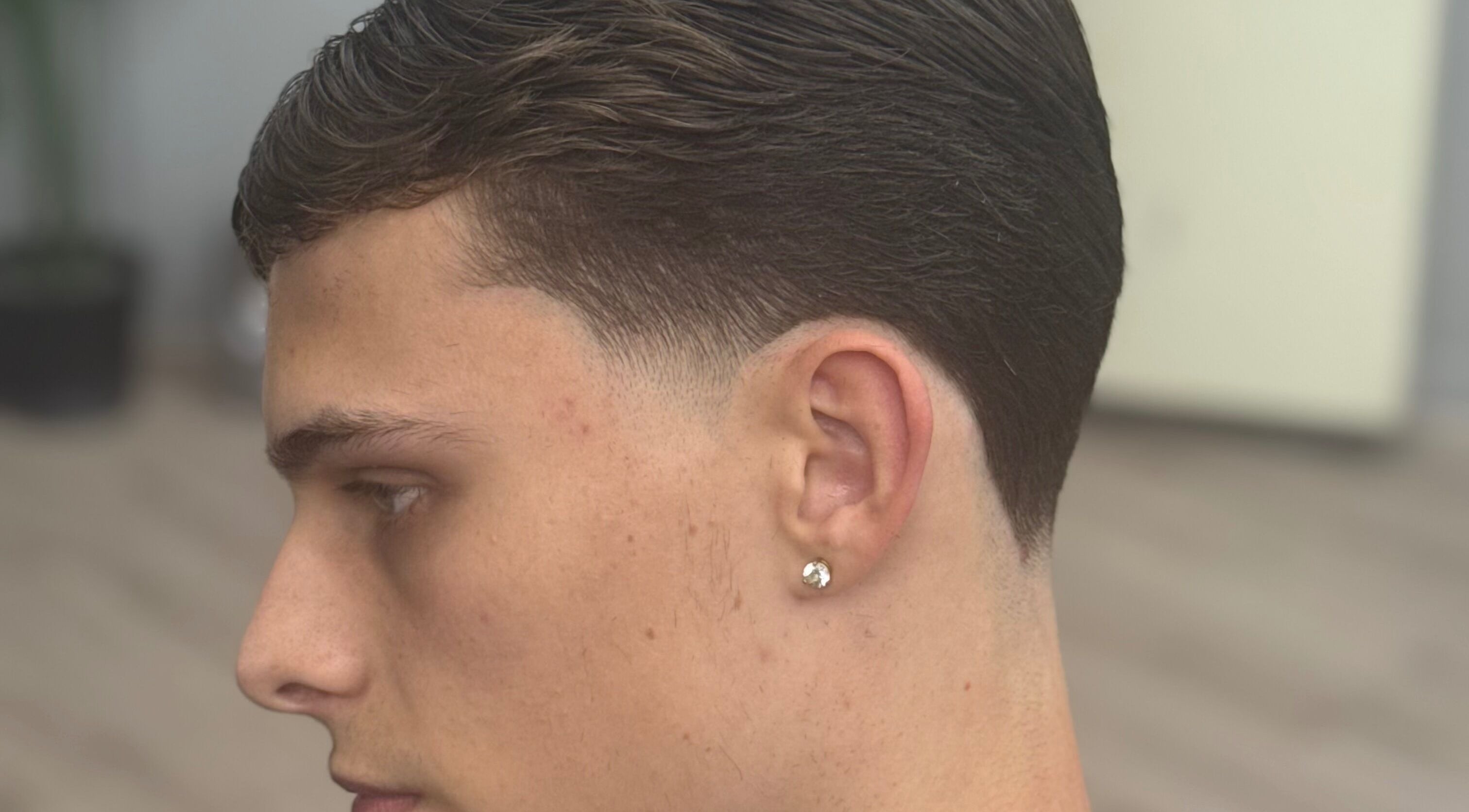 Side profile of a fresh haircut at ODCUTZ, Portlaoise, County Laois, IE highlighting clean lines.