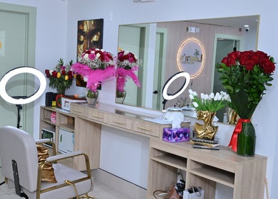 Stylish beauty station at Laura's Beauty Touch, Rego Park, NY, with vibrant flowers and elegant decor.