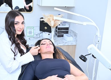 Lash treatment at Laura's Beauty Touch in Rego Park, NY, US. Client receives expert beauty care.