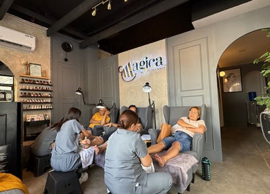 Inside Magica Brows and Beauty Cubao, Quezon City, Metro Manila, PH showing people enjoying beauty treatments.