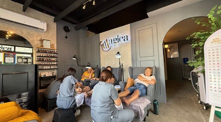 Inside Magica Brows and Beauty Cubao, Quezon City, Metro Manila, PH showing people enjoying beauty treatments.