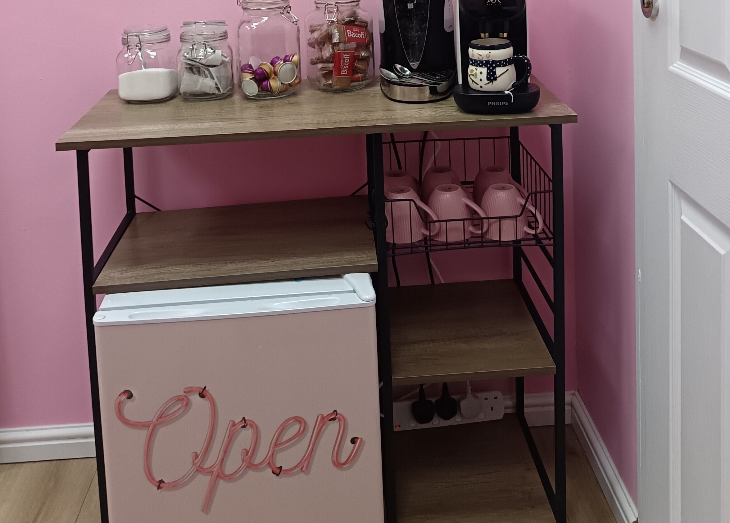 Franks coffee station with pink decor and snacks in Cheadle, England, GB.