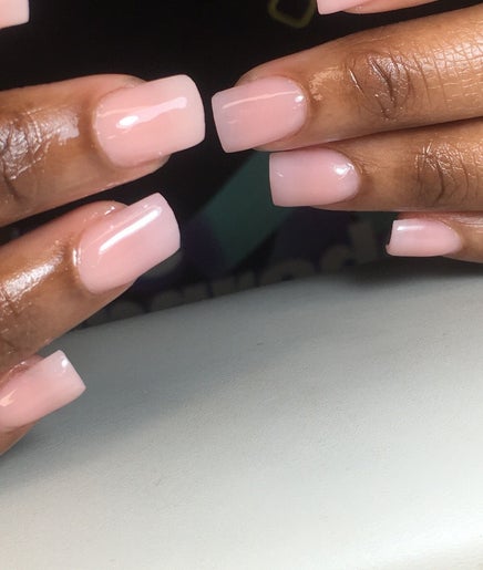 Elegant manicure at Dee’s Nail Diaries, Ga-rankuwa, Gauteng, ZA, showcasing glossy pink nails.