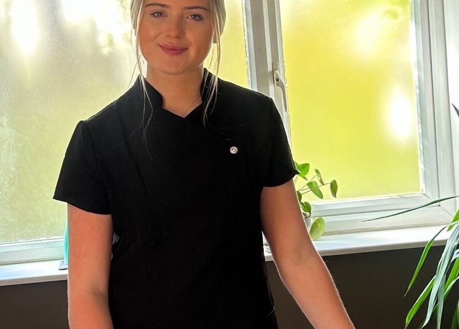 Therapist at Phoebe’s Recovery Zone in Goodrich, England, GB, ready to welcome clients in a tranquil setting.