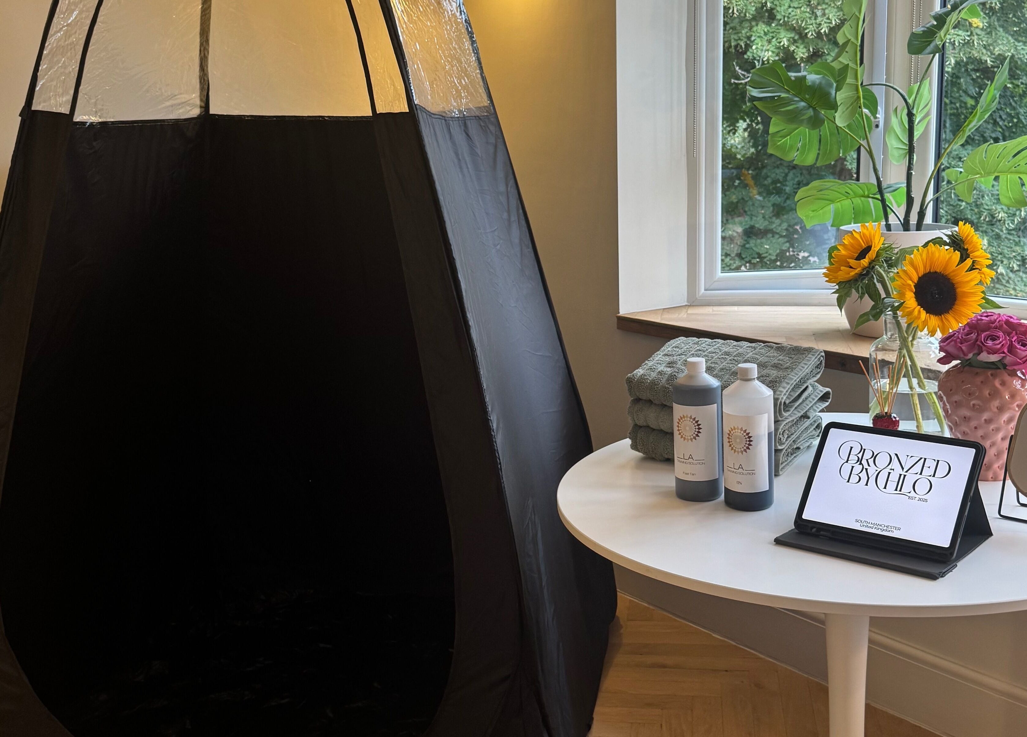 Tanning booth and products at Bronzed by Chlo, Manchester, England, GB.