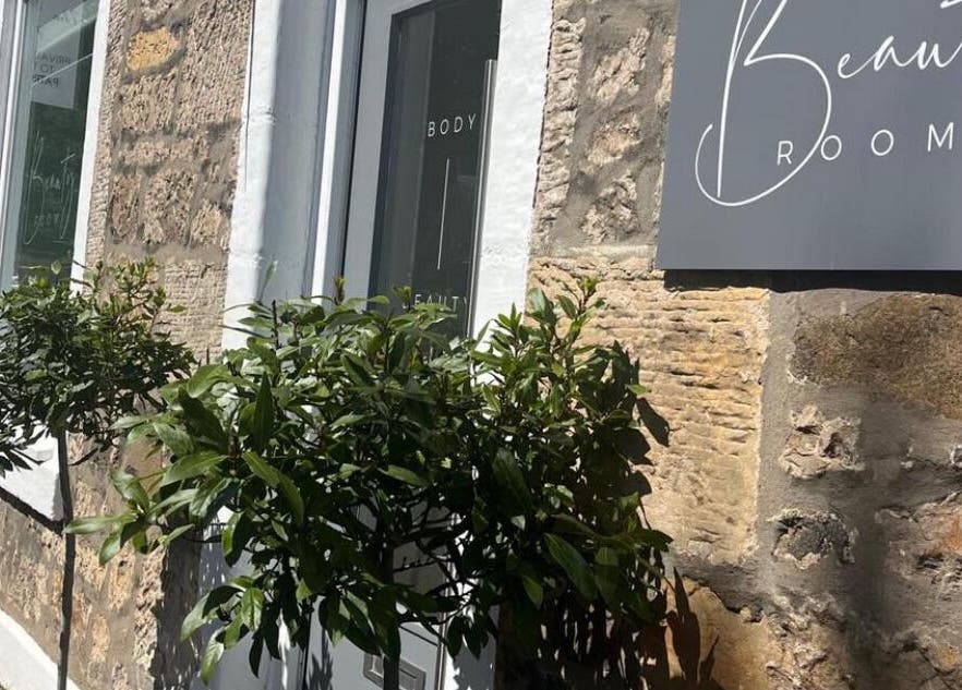 Entrance of Radiance beauty venue with a stone facade in Aberdour, Scotland, GB.