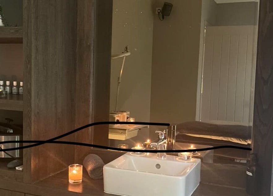 Cozy spa setting with candles and sink at Radiance, Aberdour, Scotland, GB. Perfect for relaxation and wellness.