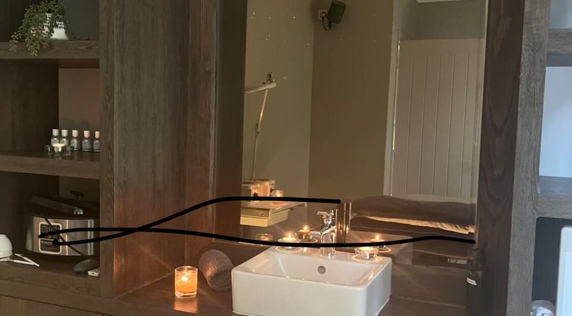 Cozy spa setting with candles and sink at Radiance, Aberdour, Scotland, GB. Perfect for relaxation and wellness.