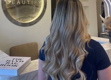 Luxurious blonde hair with extensions at SC Hair Extension Specialist, Euxton, England, GB.