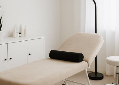 Relaxing treatment room at Beat by clo, Burntwood, England, GB, featuring a cozy massage table and soothing decor.