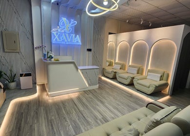 Sophisticated lobby at Xavia Medical Aesthetics in Imus, Calabarzon, PH with plush seating and ambient lighting.
