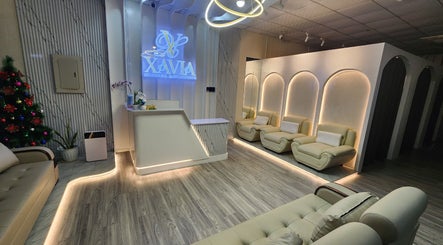 Sophisticated lobby at Xavia Medical Aesthetics in Imus, Calabarzon, PH with plush seating and ambient lighting.