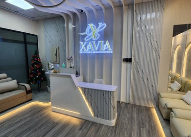 Reception area at Xavia Medical Aesthetics, Imus, Calabarzon, PH with stylish decor and comfy seating.