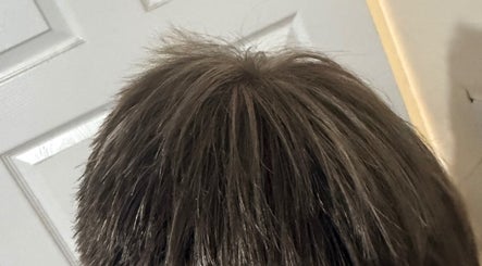 Close-up of a stylish haircut at Chlos Hair in Newport, England, GB showcasing textured layers.