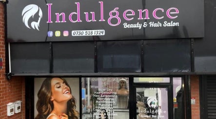 Front signage of Indulgence Beauty and Hair Salon in Salford, England, GB showcasing services offered.