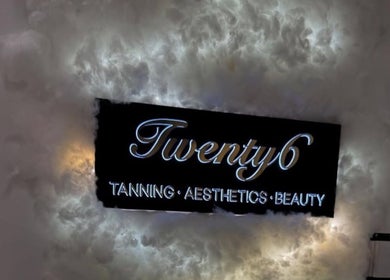 Illuminated sign for Twenty6 Tanning Aesthetics Beauty at Winks by Giulia, Rainham, England, GB.