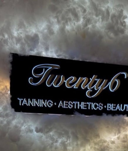 Illuminated sign for Twenty6 Tanning Aesthetics Beauty at Winks by Giulia, Rainham, England, GB.
