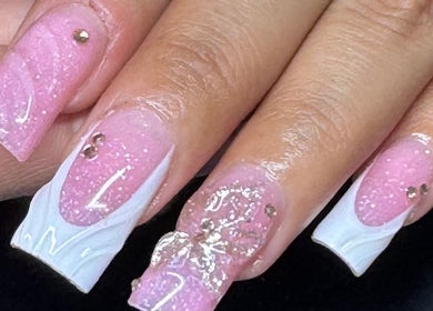 Pink and white glitter nails with gold accents at Mtbeauty, Denver, Colorado, US.