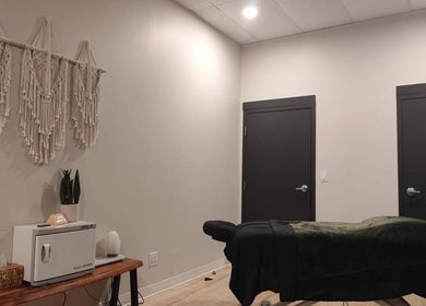 Calming therapy room at Advanced Massage Therapy, Winnipeg, Manitoba, CA with a massage table and soothing decor.