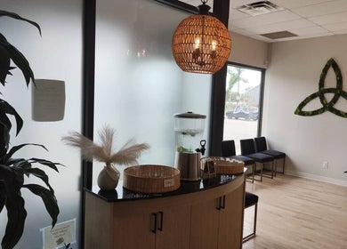 Peaceful waiting area at Advanced Massage Therapy, Winnipeg, Manitoba, CA, featuring elegant decor.