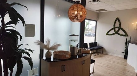 Peaceful waiting area at Advanced Massage Therapy, Winnipeg, Manitoba, CA, featuring elegant decor.
