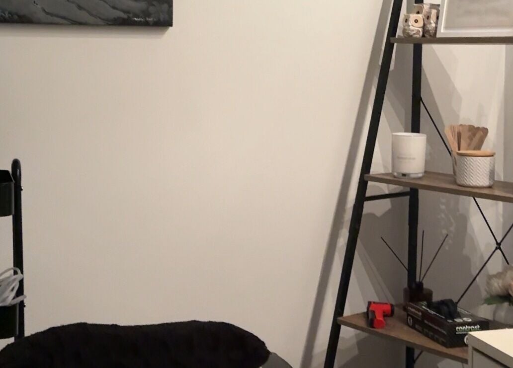 Serene treatment room at Bodiess By Bri, Huntingdale, WA with modern decor and wellness essentials.