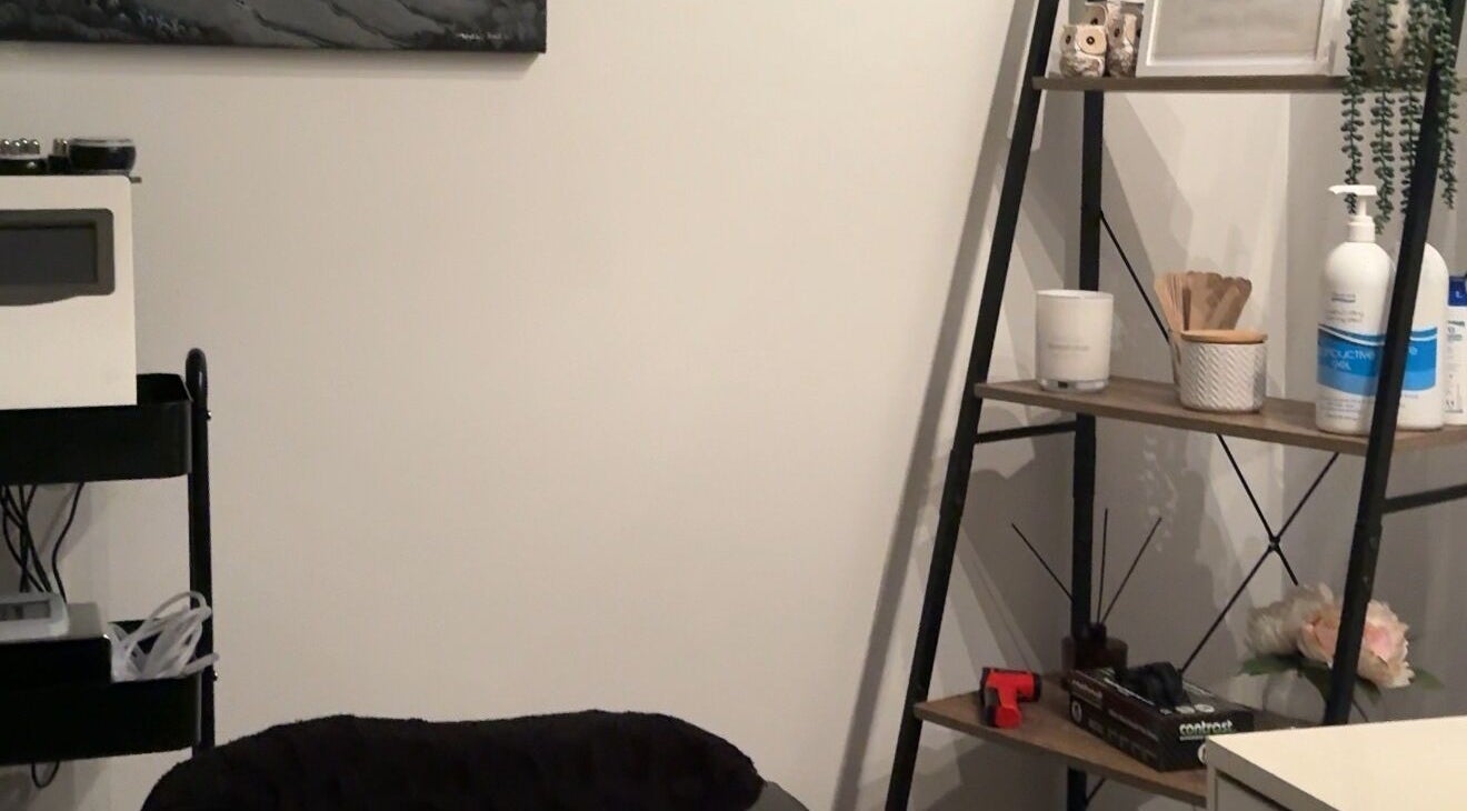 Serene treatment room at Bodiess By Bri, Huntingdale, WA with modern decor and wellness essentials.