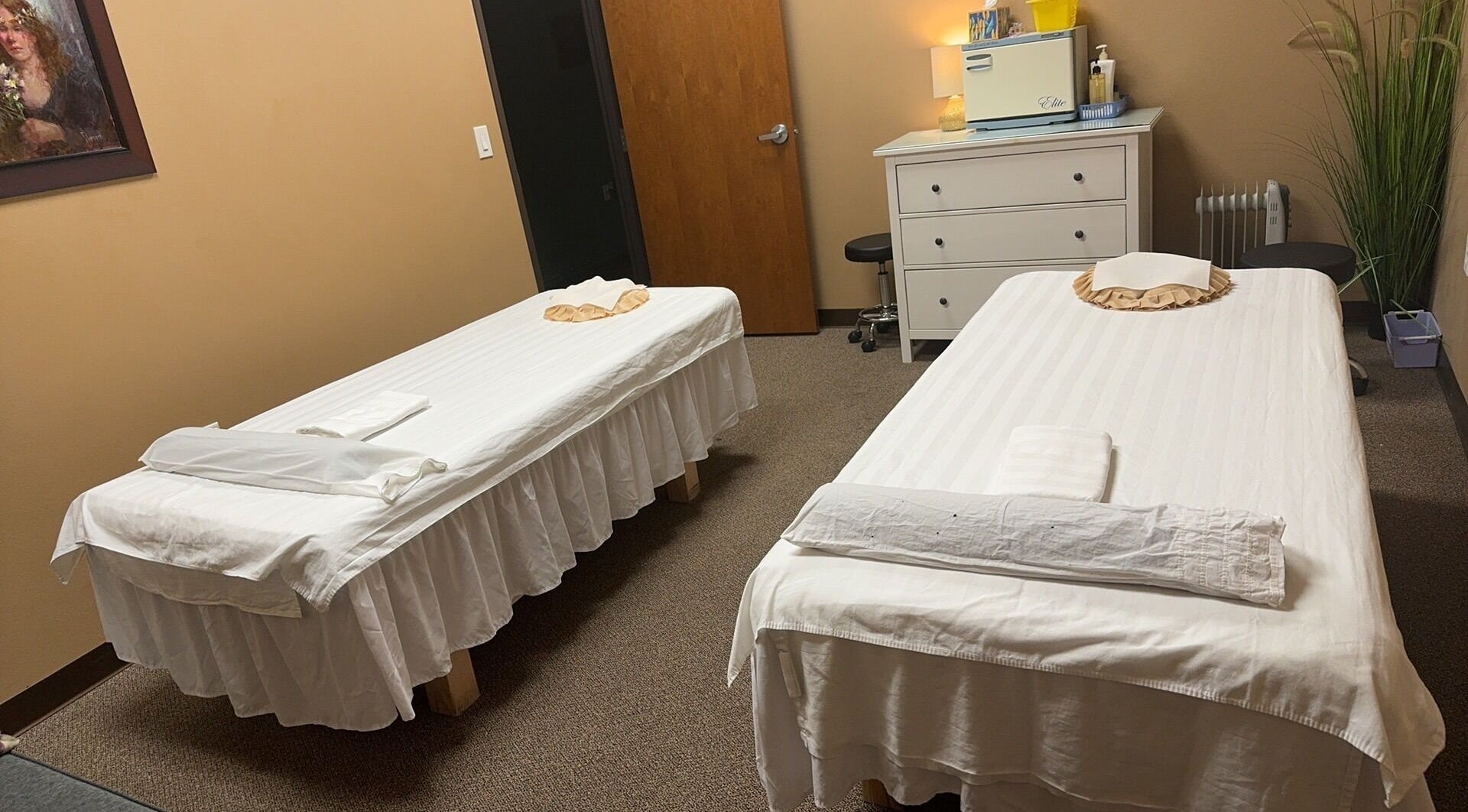 Peaceful massage room at Weatherford Massage, Weatherford, Texas, US, featuring two prepared tables.