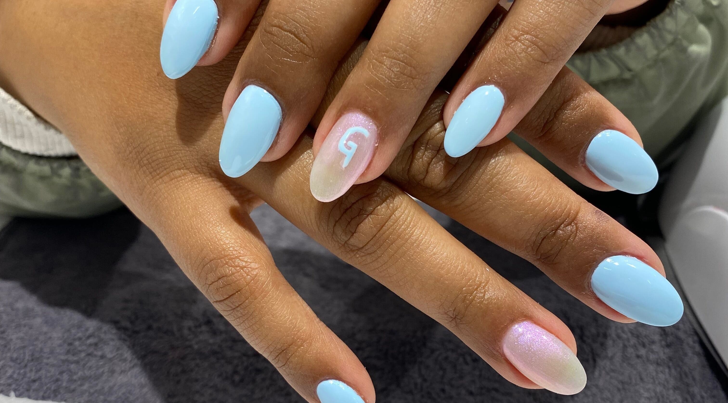 Aqua blue nails with art at Beauty Affair Studio, Cape Town, Western Cape, ZA.