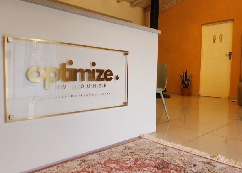 Entrance of Optimize IV Lounge in Randburg, Gauteng, ZA with elegant decor and comfortable seating.