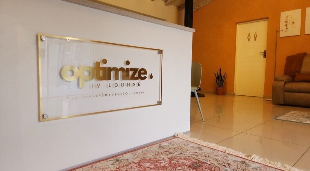Entrance of Optimize IV Lounge in Randburg, Gauteng, ZA with elegant decor and comfortable seating.