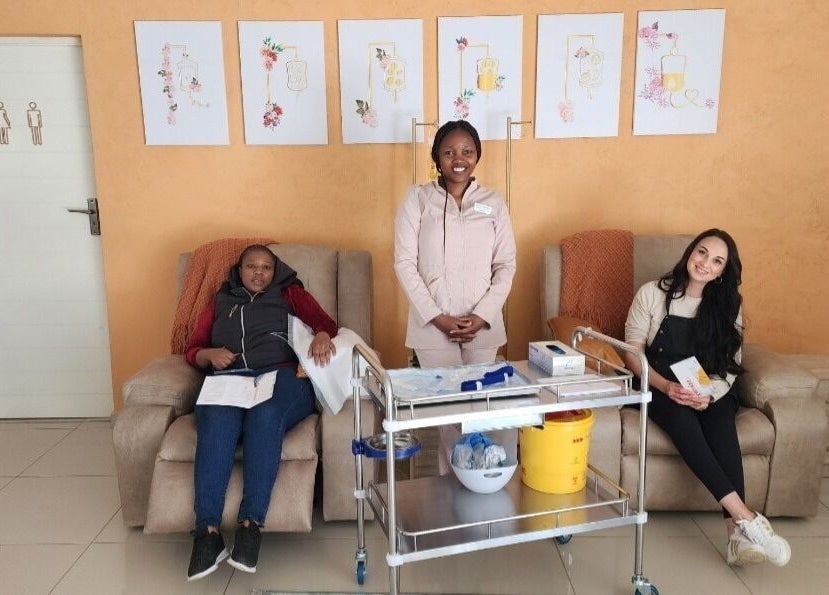 Relaxing lounge area at Optimize IV Lounge, Randburg, Gauteng, ZA, showcasing comfortable seating and friendly staff.