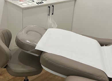 Comfortable treatment chair at Jessica Sweet SPMU, London, England, GB, ready for beauty and wellness services.