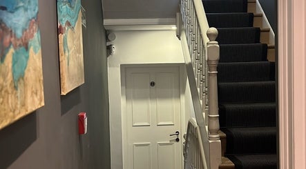 Chic staircase with artwork at Jessica Sweet SPMU, London, England, GB